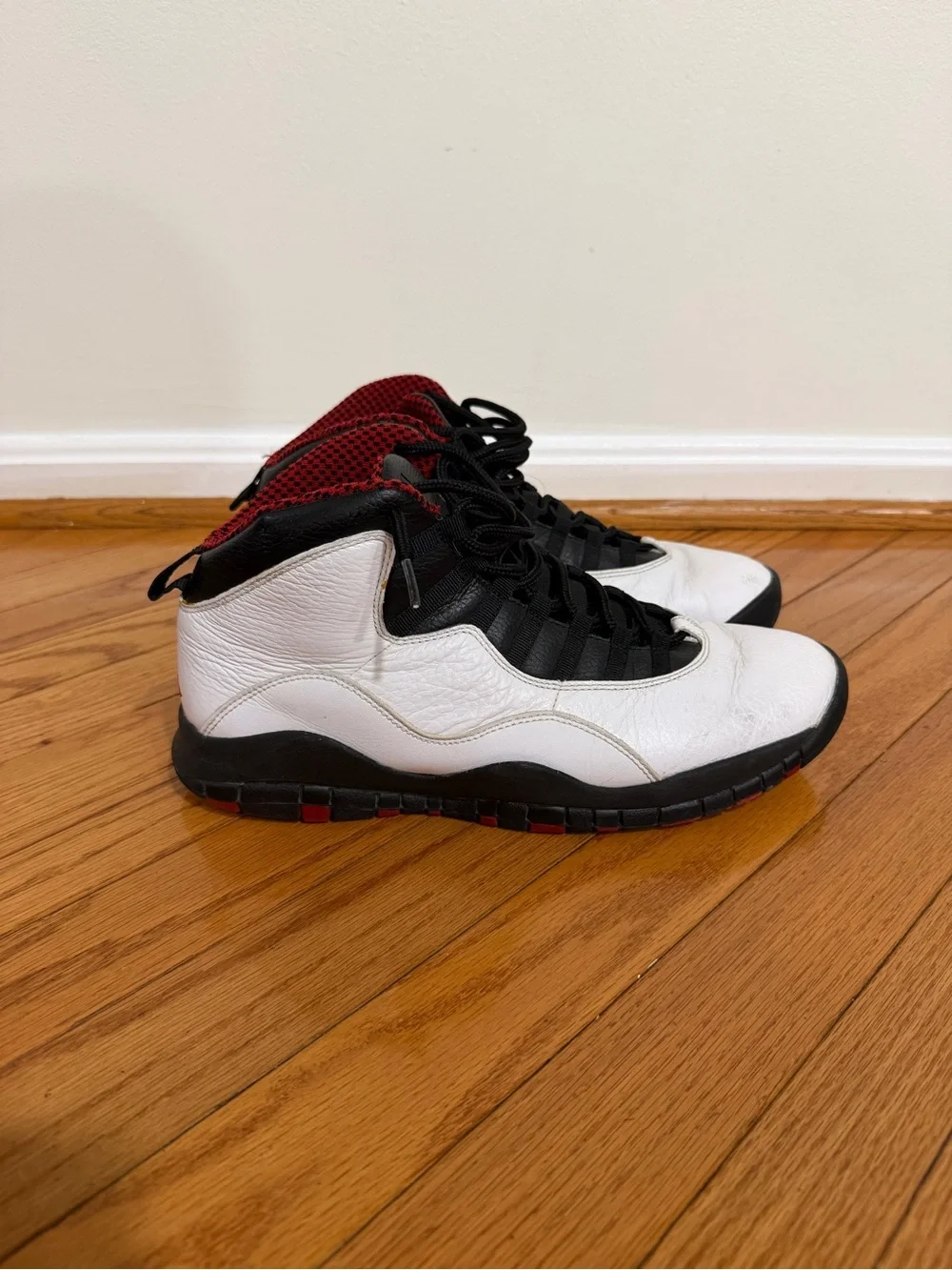 Jordan Retro ‘Bull’ 10 High-Top Sneakers in White, Black & Red